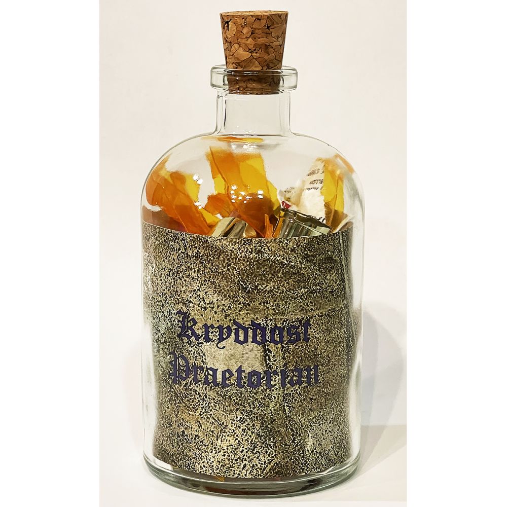 <br/>Kryddost Praetorian, 10/9/2025<br/>Apx 6½" x 3" x 3"<br/>glass, paper, ink, cork, plastic and acrylic